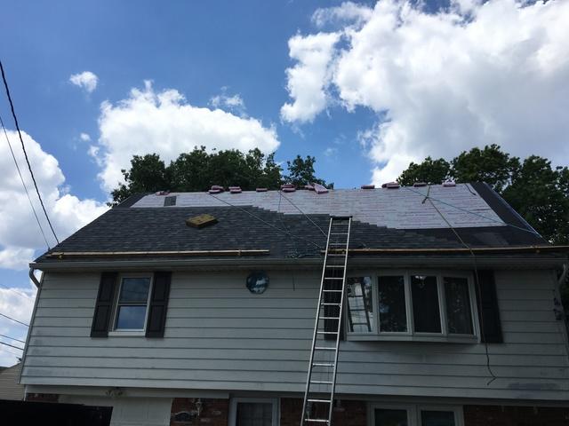 Putting in the new shingles