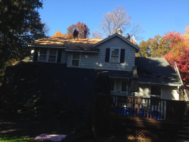 Removing the shingles and putting in the new wood